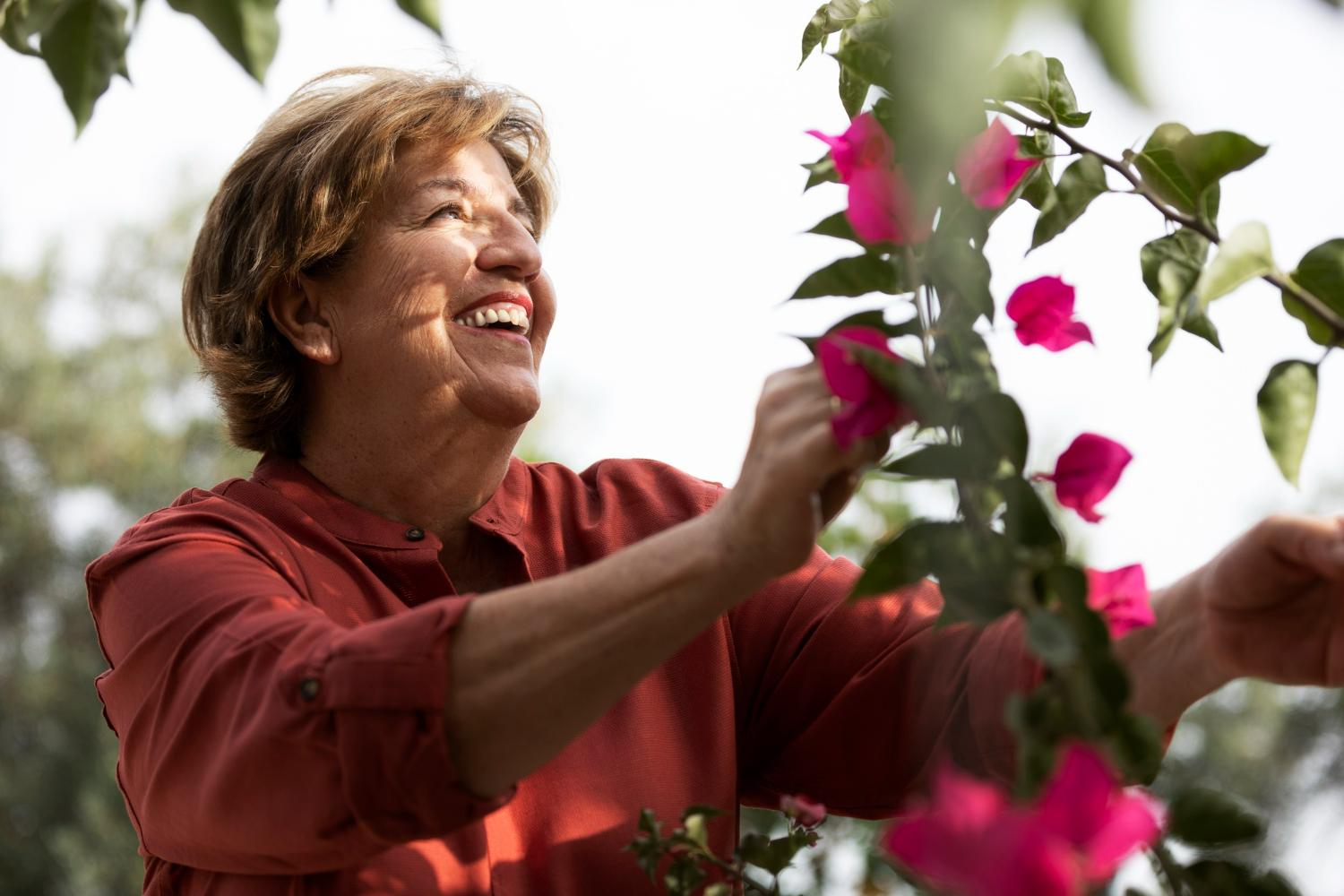 elderly woman gardening happy
